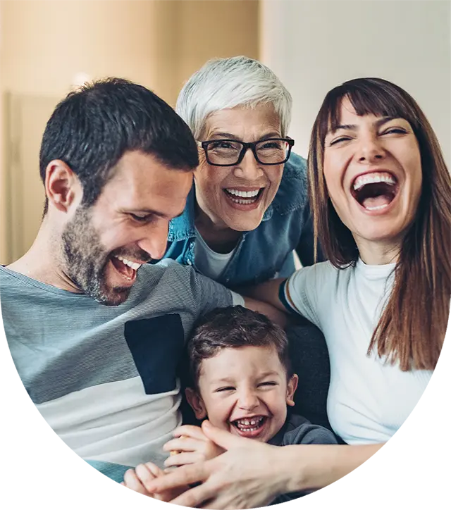 Multi-generational family laughing together